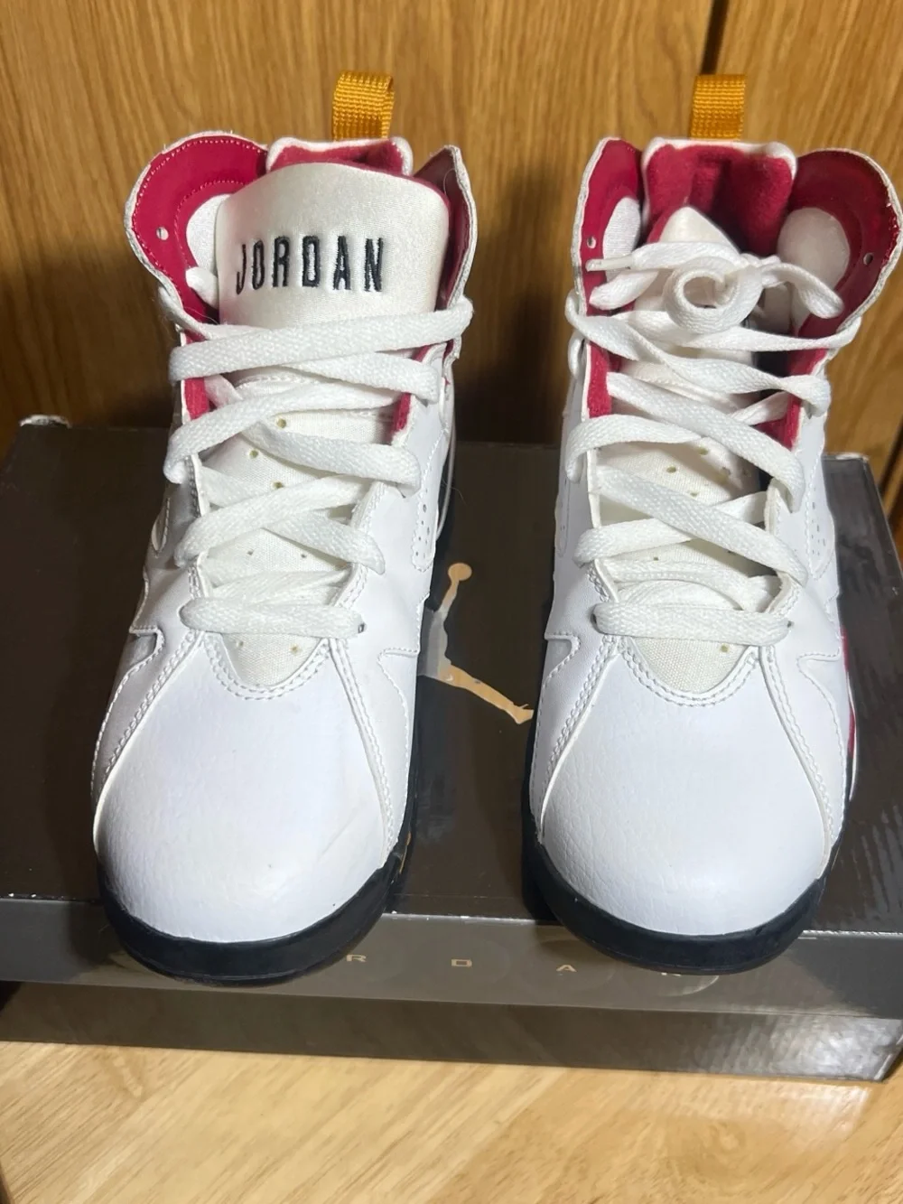 Jordan Kids White High-Top Sneakers with Pink Lining and Yellow Heel Tabs